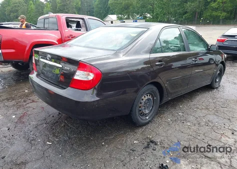 2002 Toyota Camry Le from USA, damaged, VIN JTDBE32K620108572